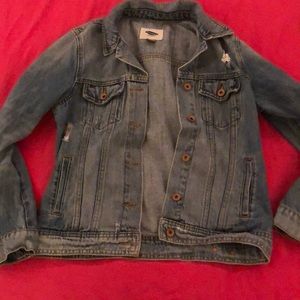 a distressed jean jacket